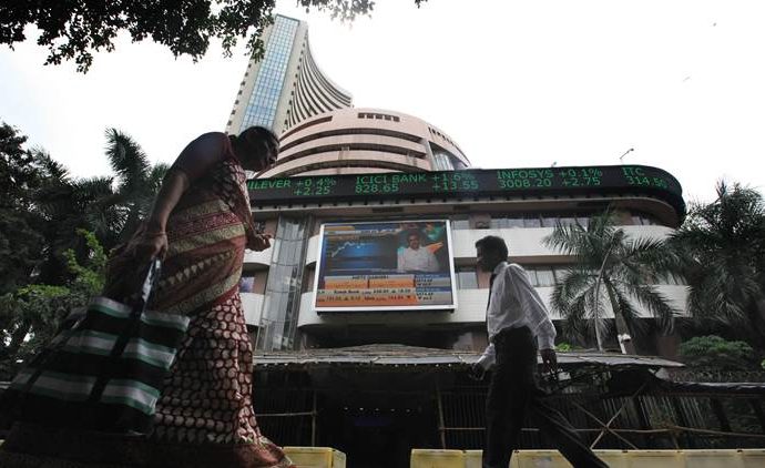 Sensex falls over 100 pts on weak rupee, negative global cues